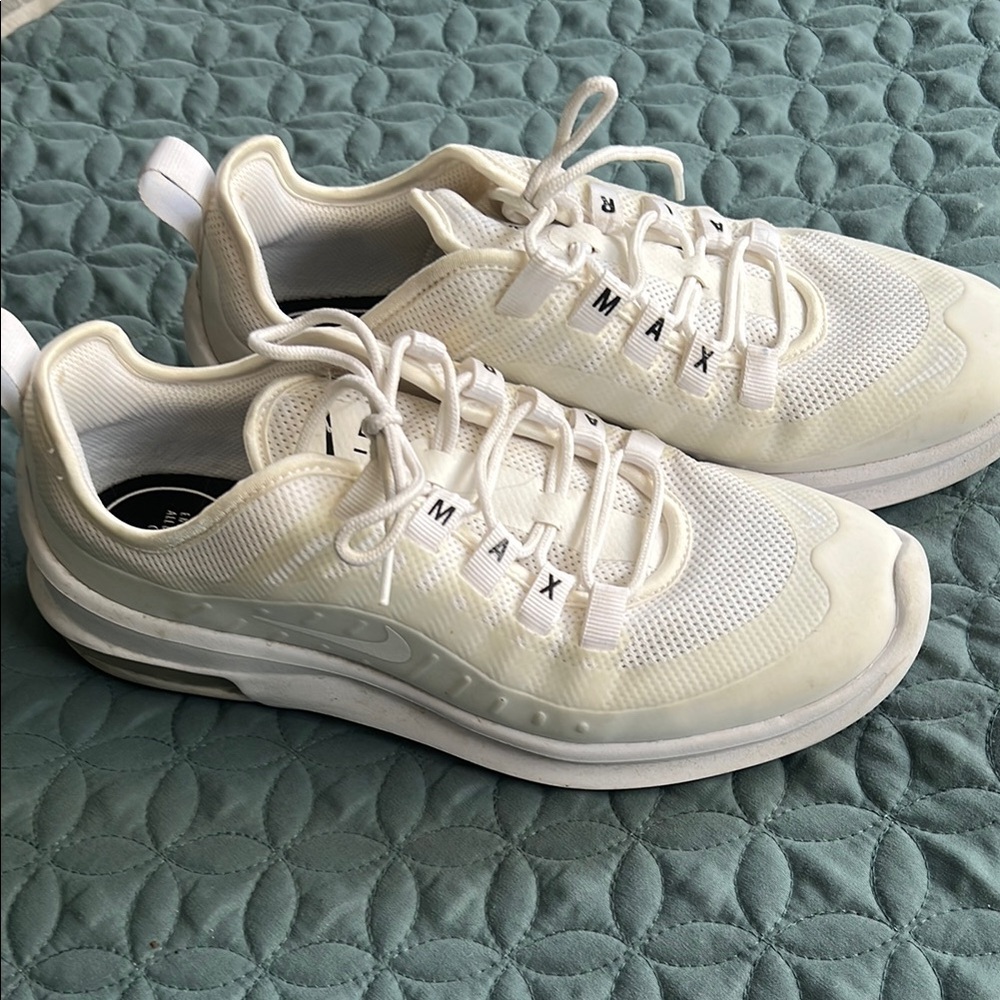 Nike White Sneakers with Textured Fabric and Cushioned Sole